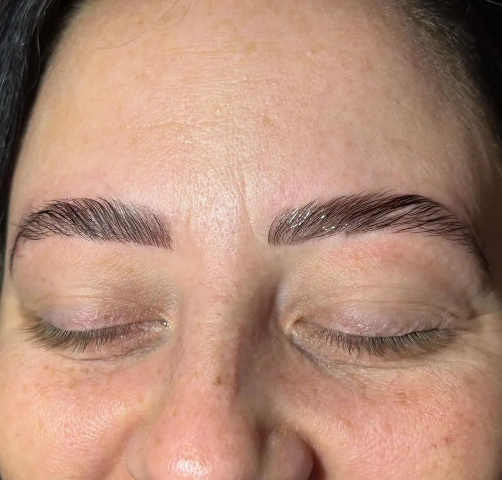 Freshly laminated and tinted brows by Ellie